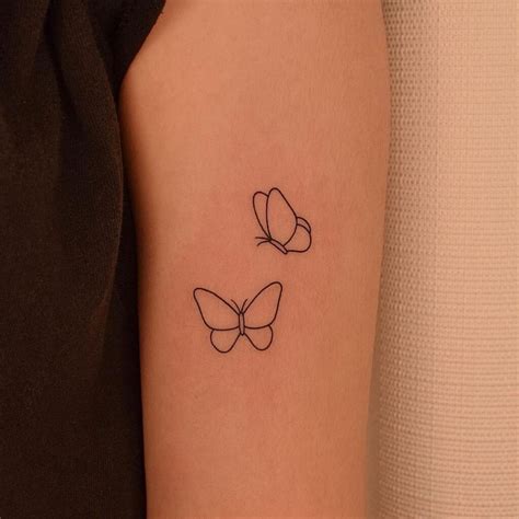 guy butterfly tattoo|simple butterfly outline tattoo.